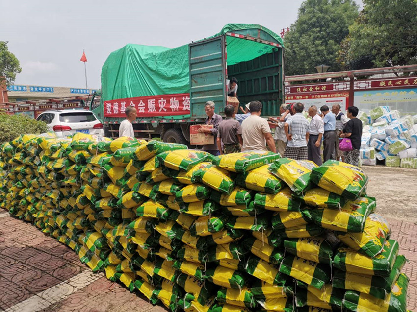 民建安庆市委会携手爱德基金会赴桐城市、太湖县赈灾