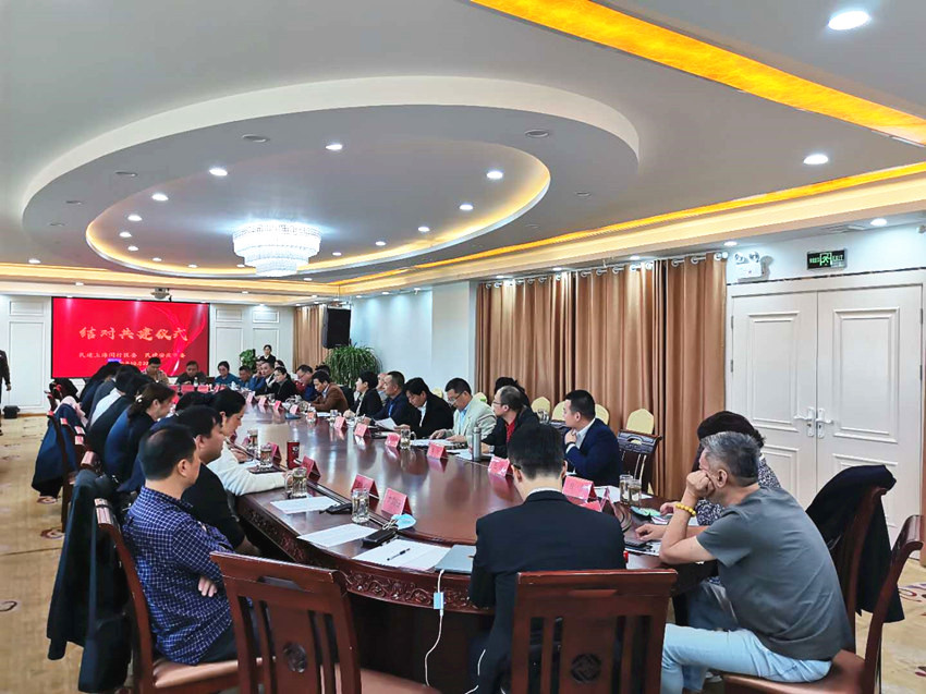 民建上海闵行区委主委宋运堂一行来宜考察交流