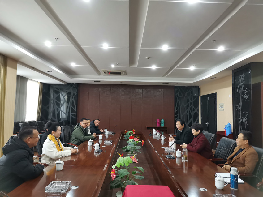 朱菊云赴民建市委直属一支部走访调研